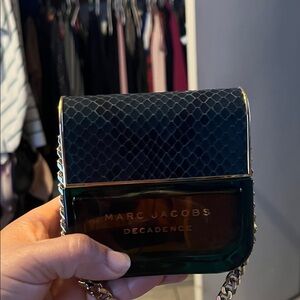 Marc Jacobs Green and Gold Clutch Sprayed about twice;